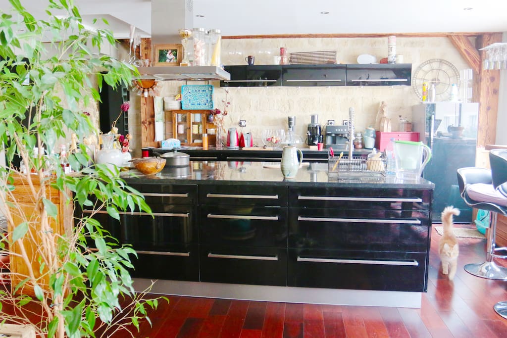 The kitchen is equiped and functional.