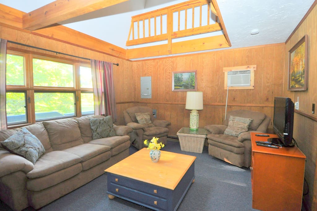 Kick up your feet and relax in the cozy Living Room!