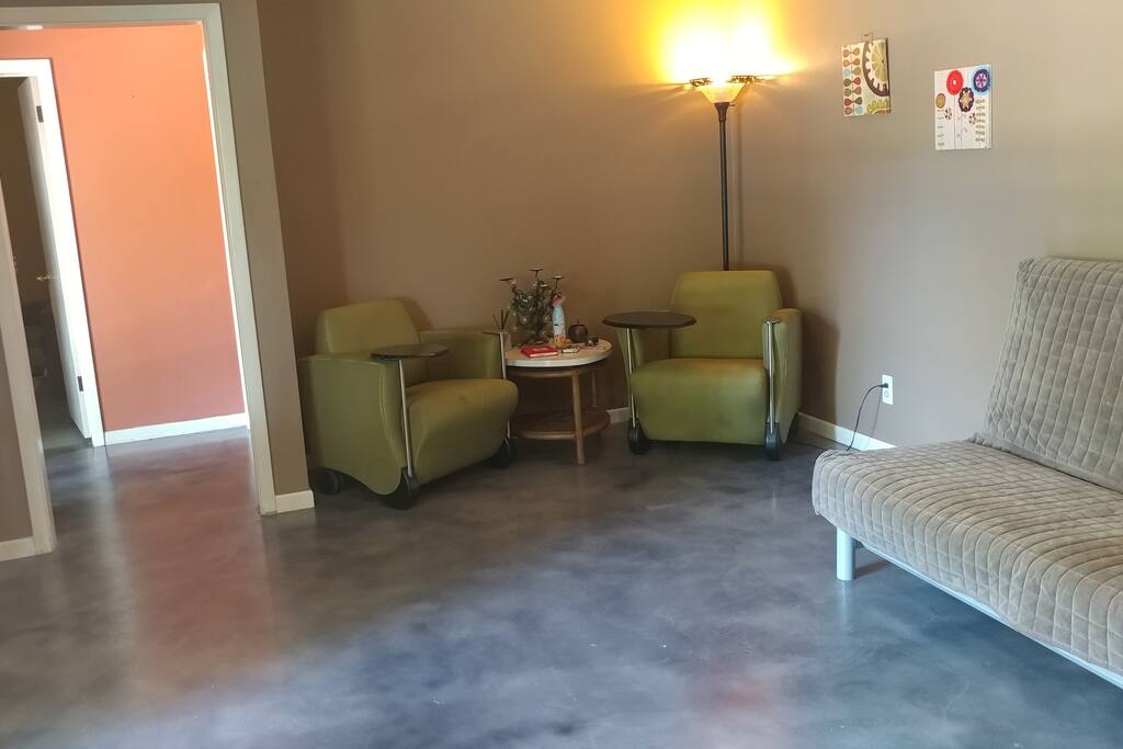 Spacious living room with picture window looking toward downtown