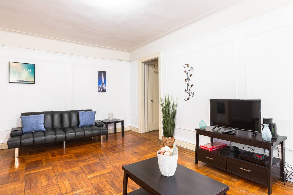 The living room is set up for plenty of space to socialize, get together and have fun.