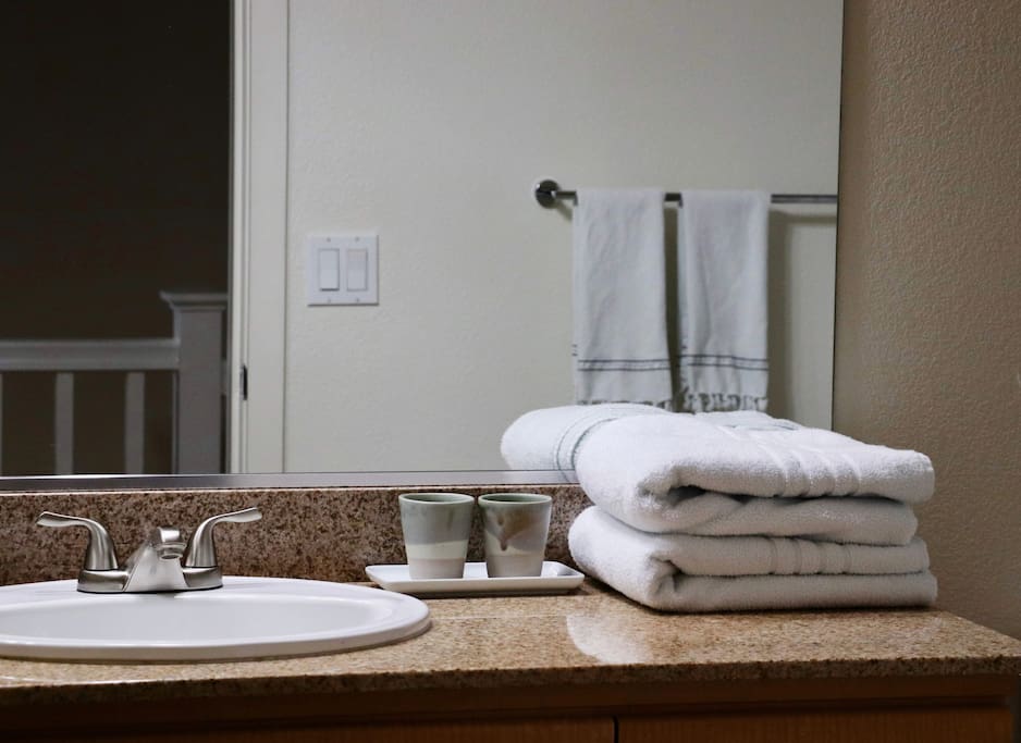 Across the hall is your private full bath with shower & tub. Fresh towels, soap, and shampoo provided.