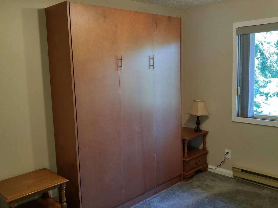 The room with the bed up