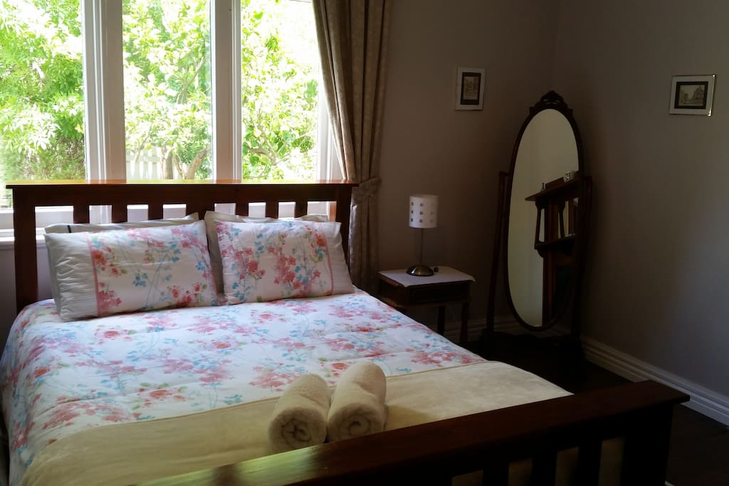 The comfortable Master Bedroom with full length cheval mirror