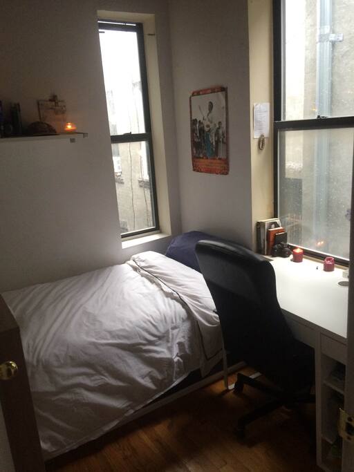 The Room: Bed, Desk, Chair, Lamp, Cupboards under the Bed and to the right. Closet in the Living Room.