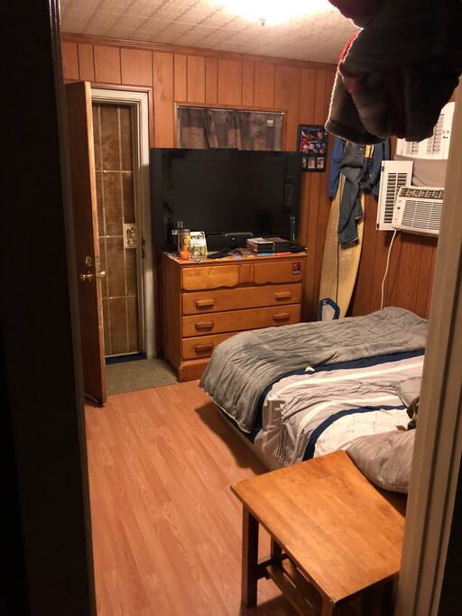 Master bedroom, door to back courtyard.