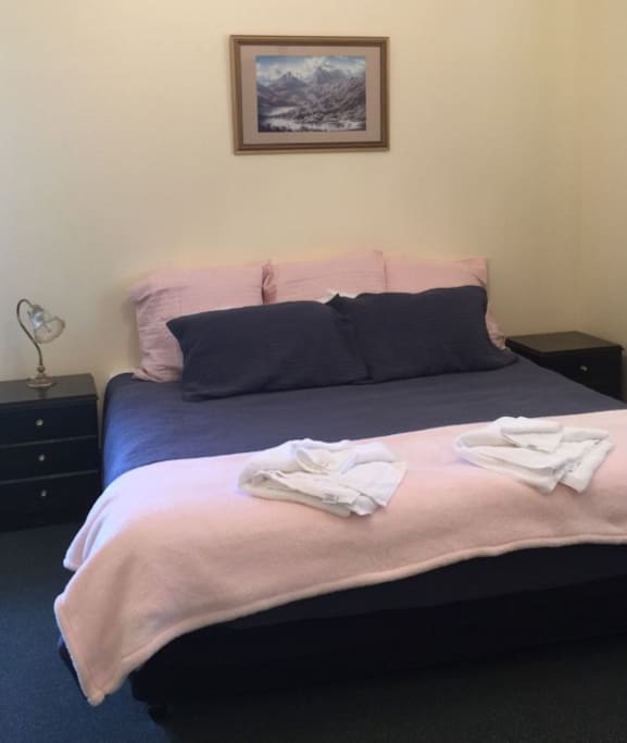Private en-suite room with King size bed , wardrobe, small fridge, TV and kettle