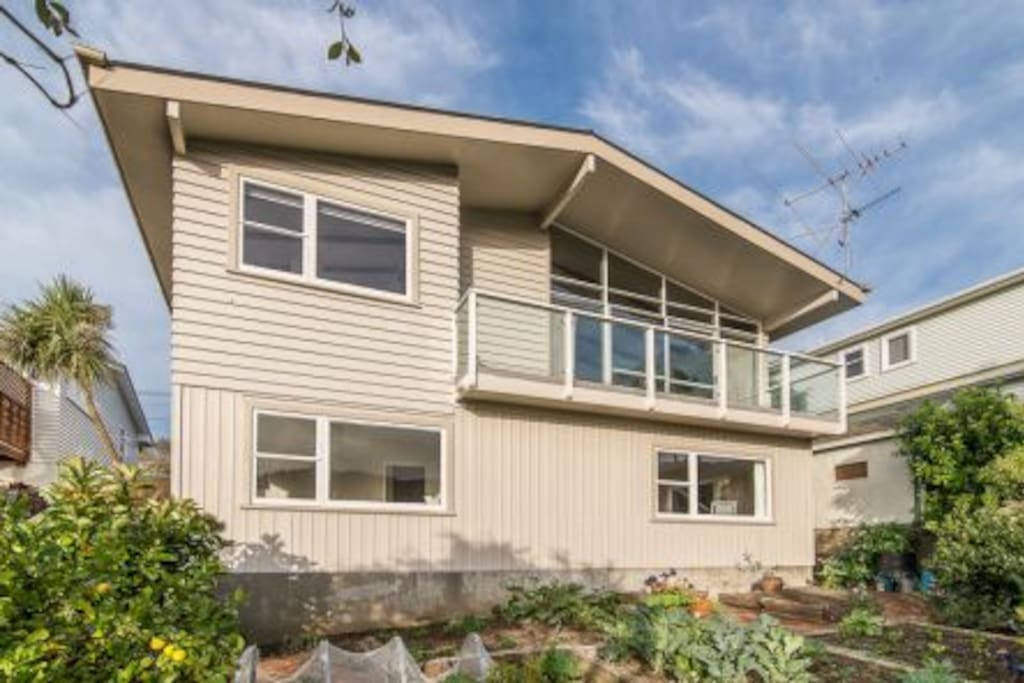 Downstairs guest suite, secluded backyard and garden, downstairs bedroom and living area windows