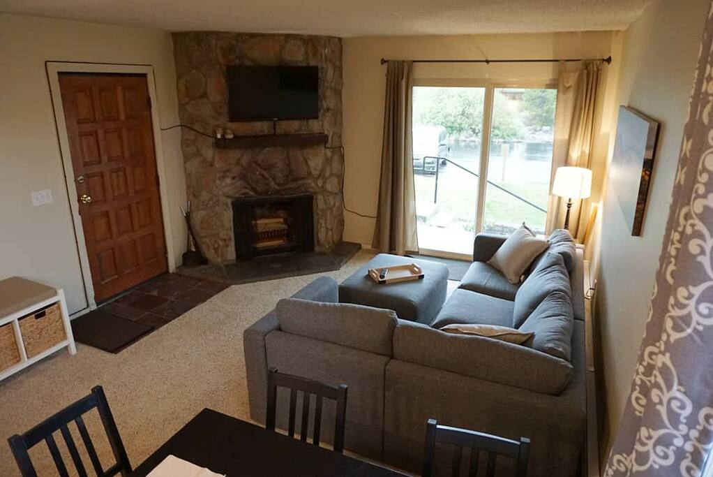 Comfortable living room for relaxing, movies or games with beautiful mountain views right outside the door!