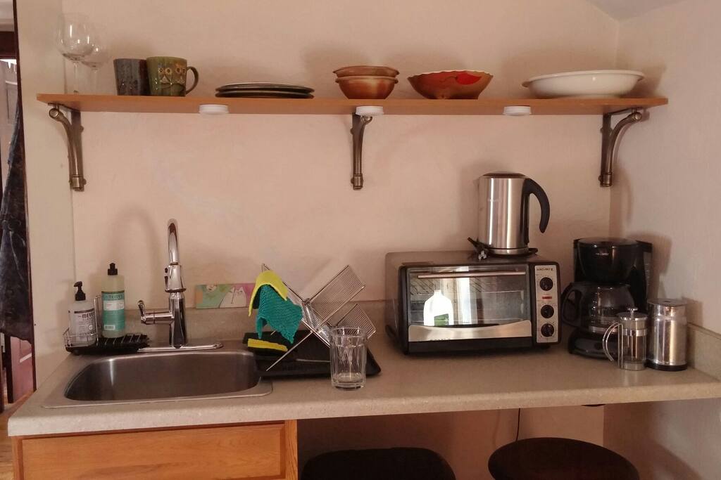 Kitchenette has a good size Fridge