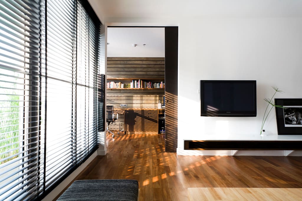 Large sliding door to the home office for an airy, open space.