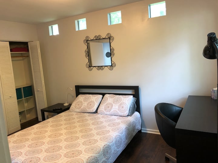 Bedroom: queen bed with firm and comfy mattress, work space, plenty of closet space.