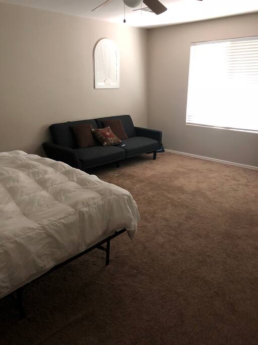 Futon couch turns into a bed