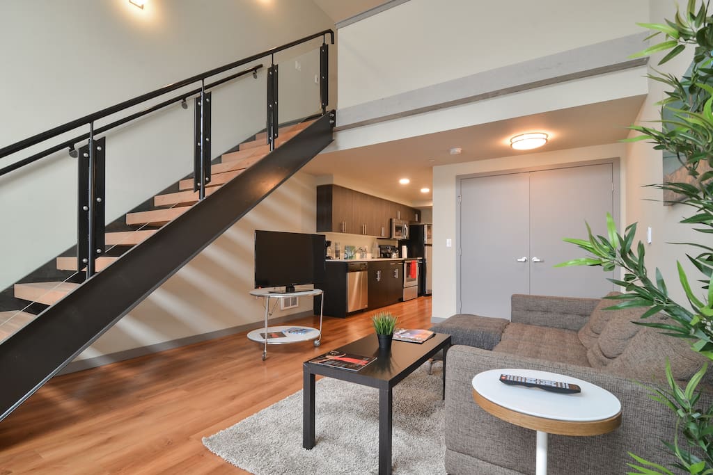 Elegant living space with modern loft.