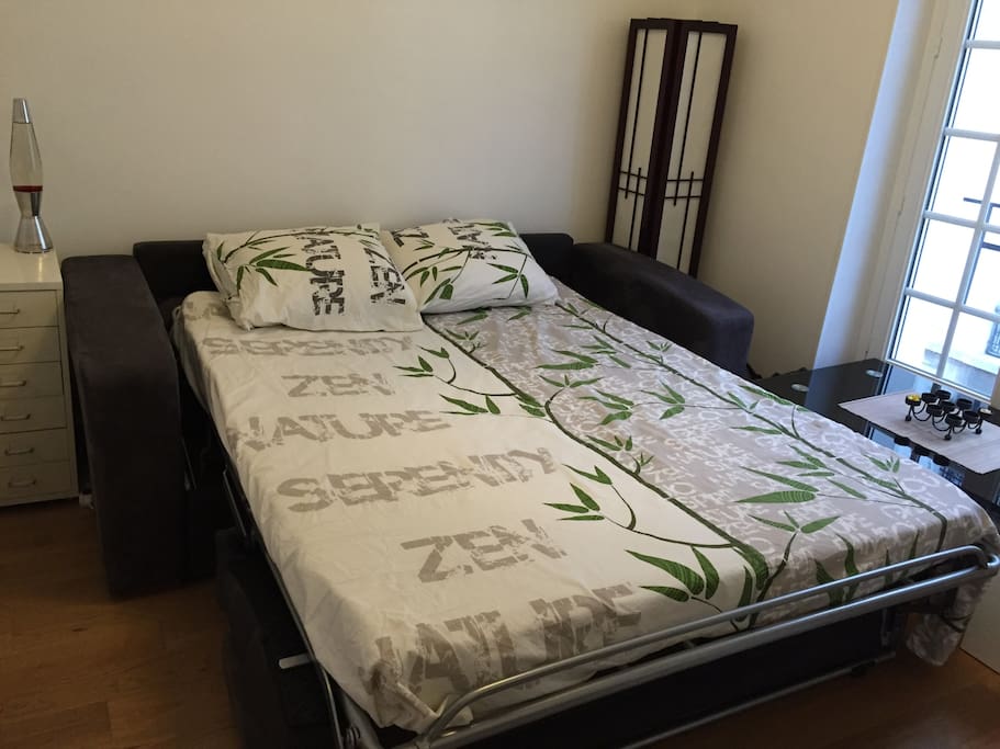 Your room with the bed
