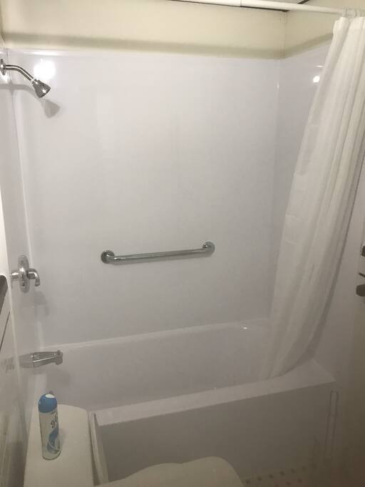 Remodeled bathtub and tub surrounds.