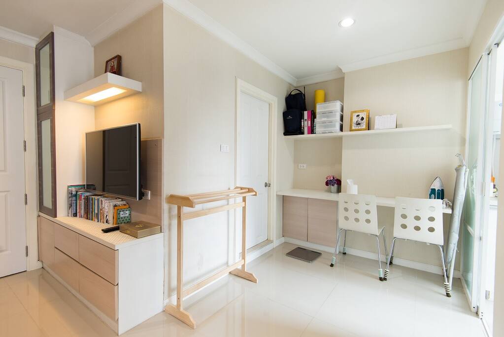 Enjoy with LED-TV 42”, Compact clothes rack, Steam Iron with its table and Breakfast bar.