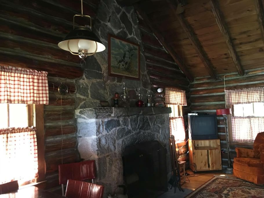 Beautiful log cabin with stone fireplace