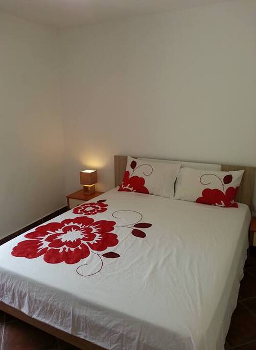 King size double bed with a private valley side terrace