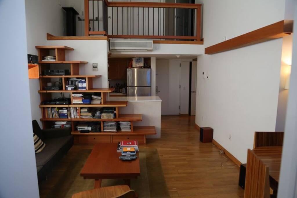 The bookshelf doubles as stairs to the upstairs office and laundry. But please be careful going up and down. Not suitable for young children.