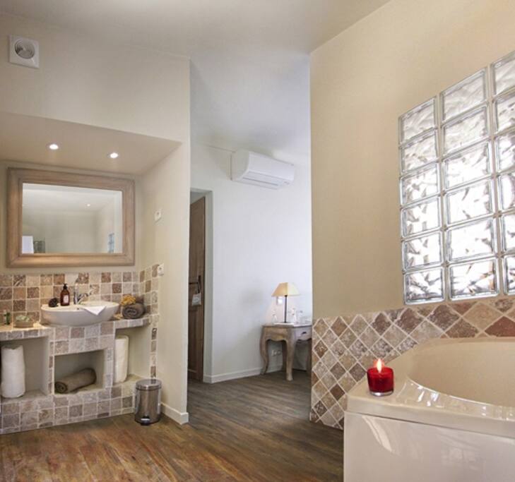 Room with luxury bathroom and whirlpool