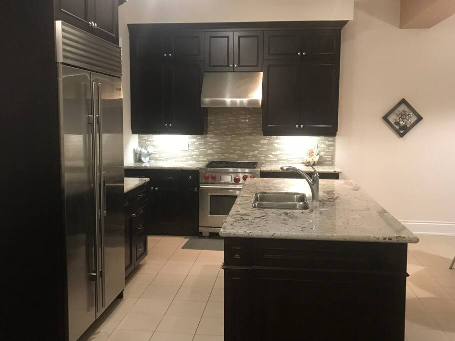 Kitchen with sub zero and wolf Appliences