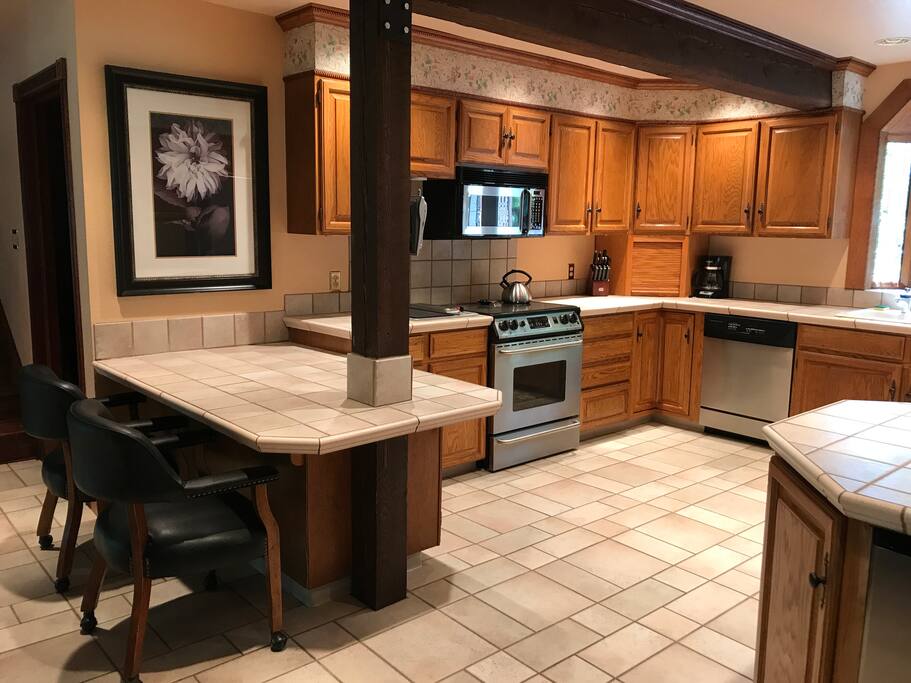 Large open Kitchen with utensils