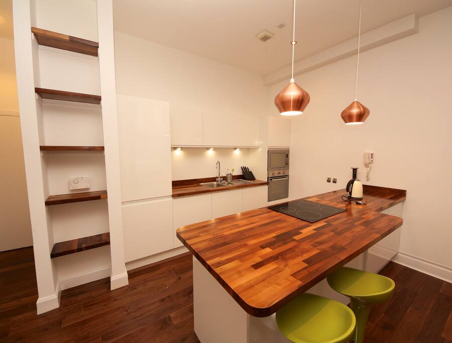 Kitchen with washing machine / dryer, dishwasher, fridge, freezer, oven, microwave & hob