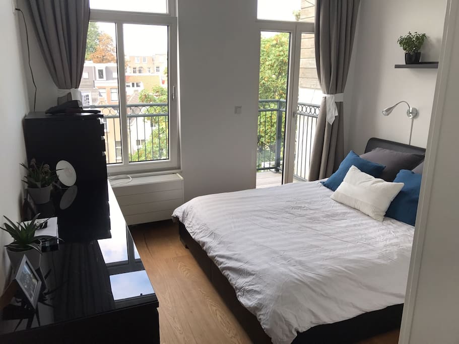 Master bedroom with balcony