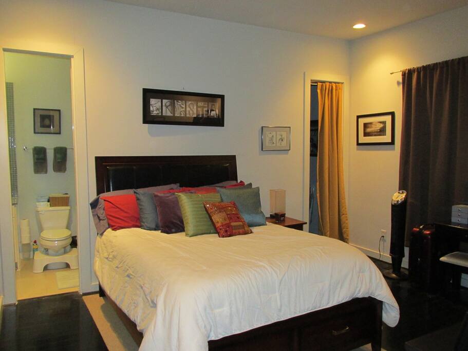 Bedroom connected to bathroom; queen bed sleeps two.