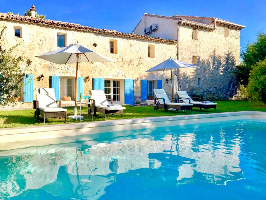Back façade of our property and the swimming pool