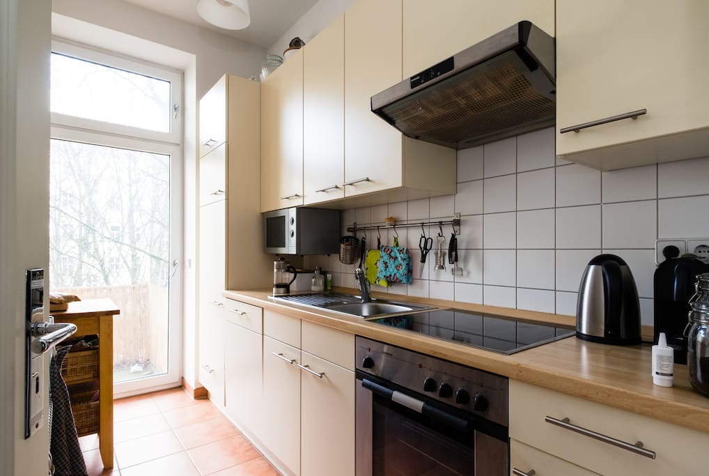 Kitchen with oven, dish washer, fridge