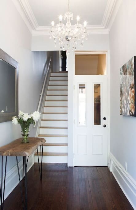 We have modernized the space but preserved historic features like plaster moldings on 10 foot high ceilings.