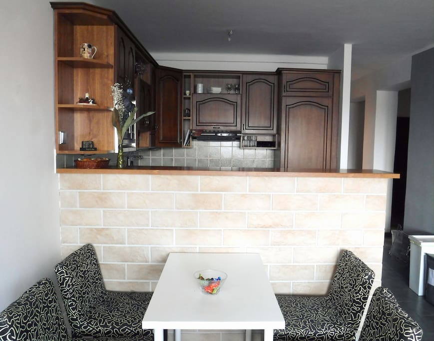 The kitchen with the dining space