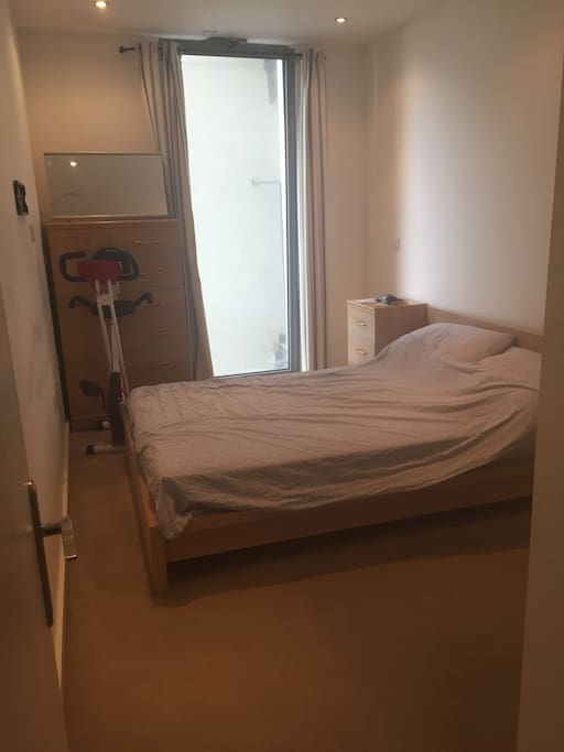 Bedroom (exercise bike will be removed) 2 bedside tables, chest of drawers and wardrobe available