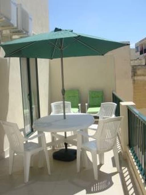 Outside terrace which plenty of sun. Very private.