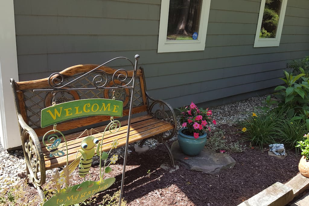 Welcome bench front of House