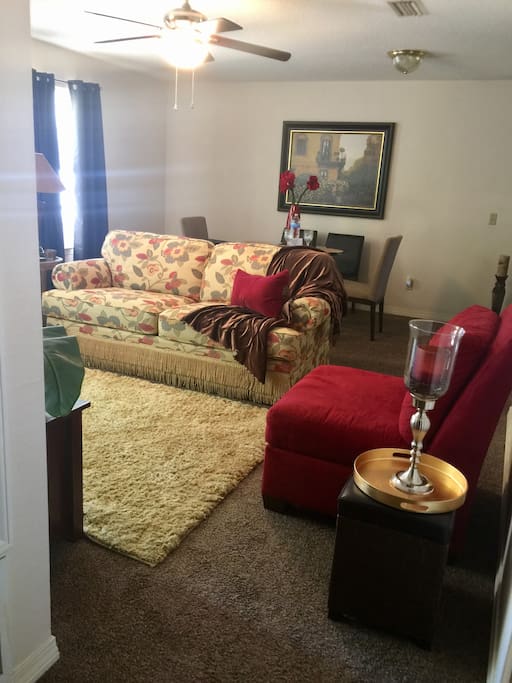 A large living room and dining combination prefect for entertaining. This is not sleep sofa.