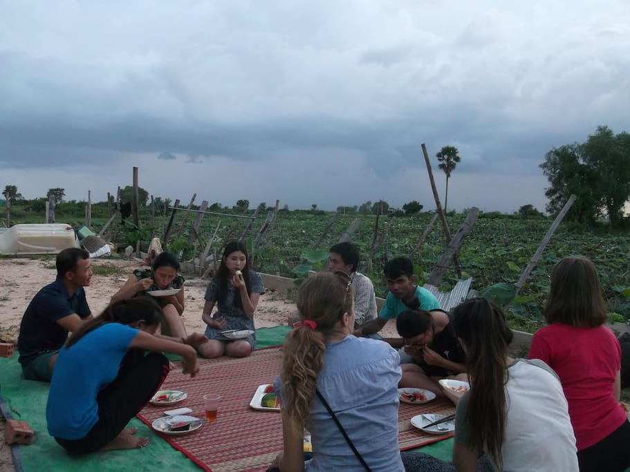 Guests enjoying an outdoor dinner.