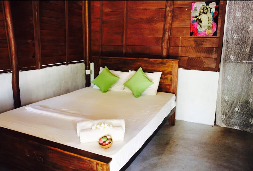 Our cabanas are individually designed rustic, traditional and with pops of colour! Check out our unique artworks. This is cabana 1.