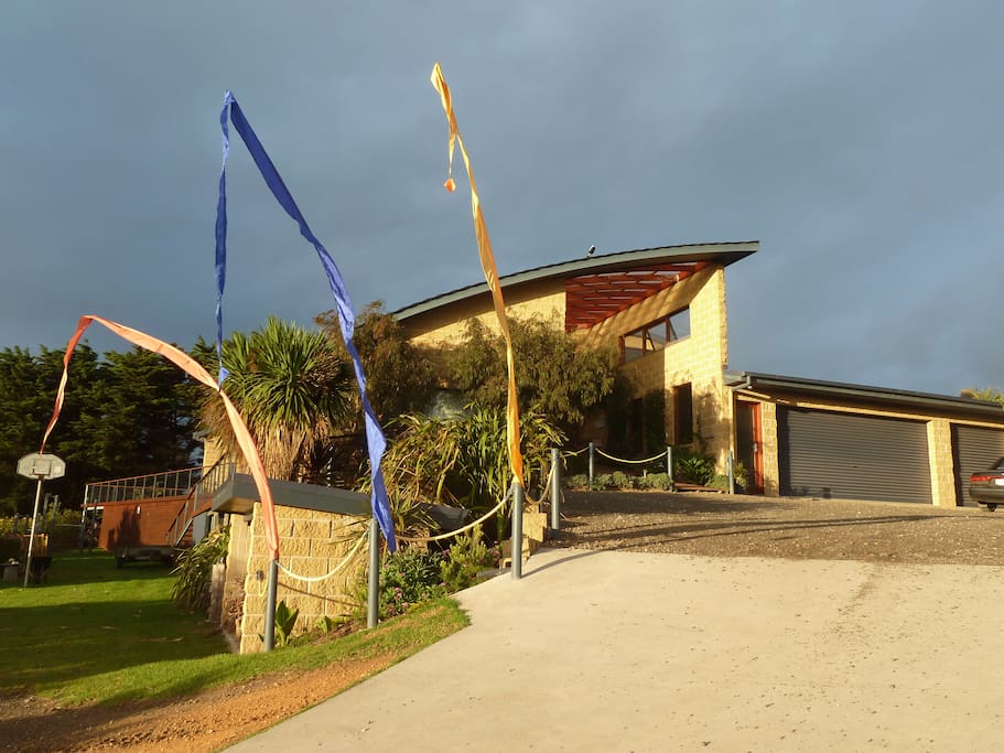The Apartment, parking spot just to the right of the flags.