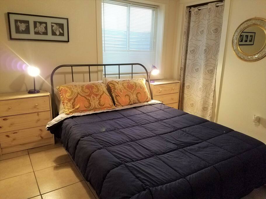 This bedroom has a queen size bed.