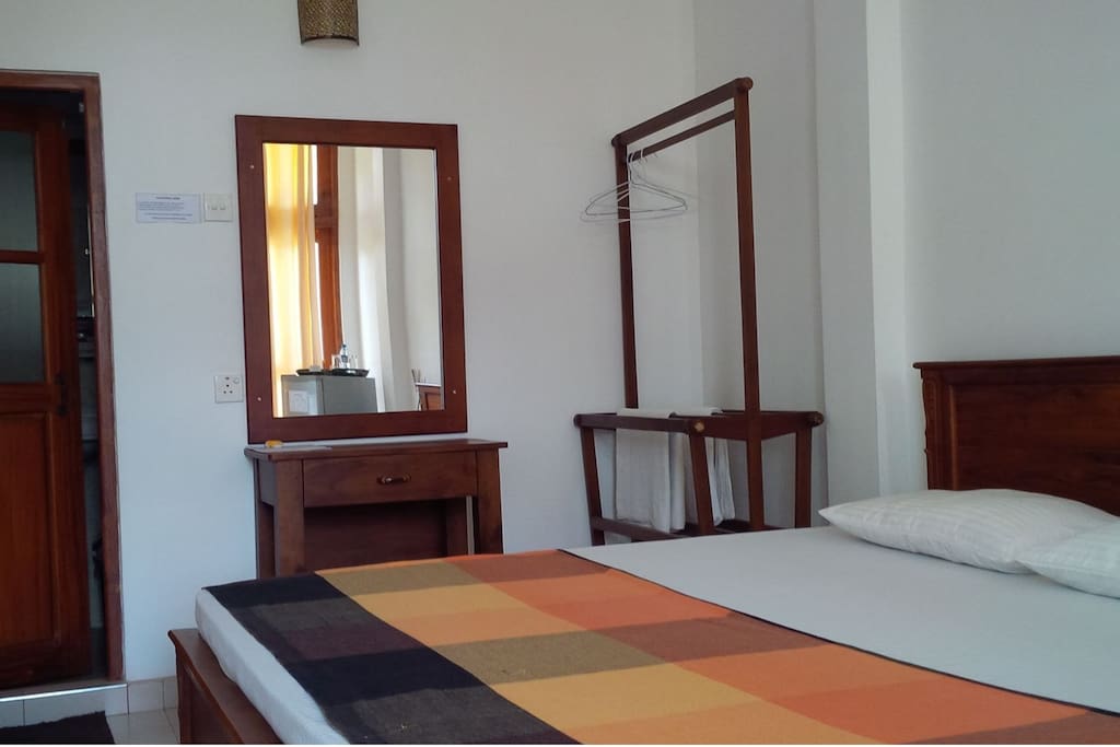 Double bed room with A/C,hot water,mini fridge & TV
