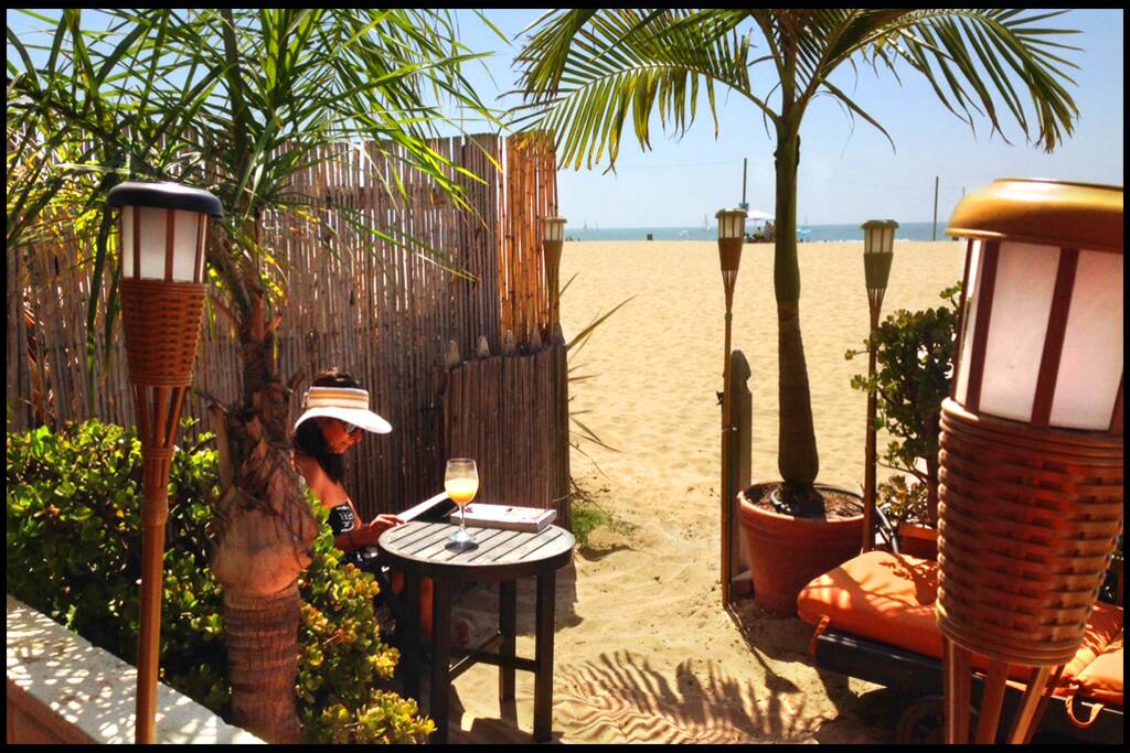 Enjoy dining or sun lounging on our private tropical sand patio