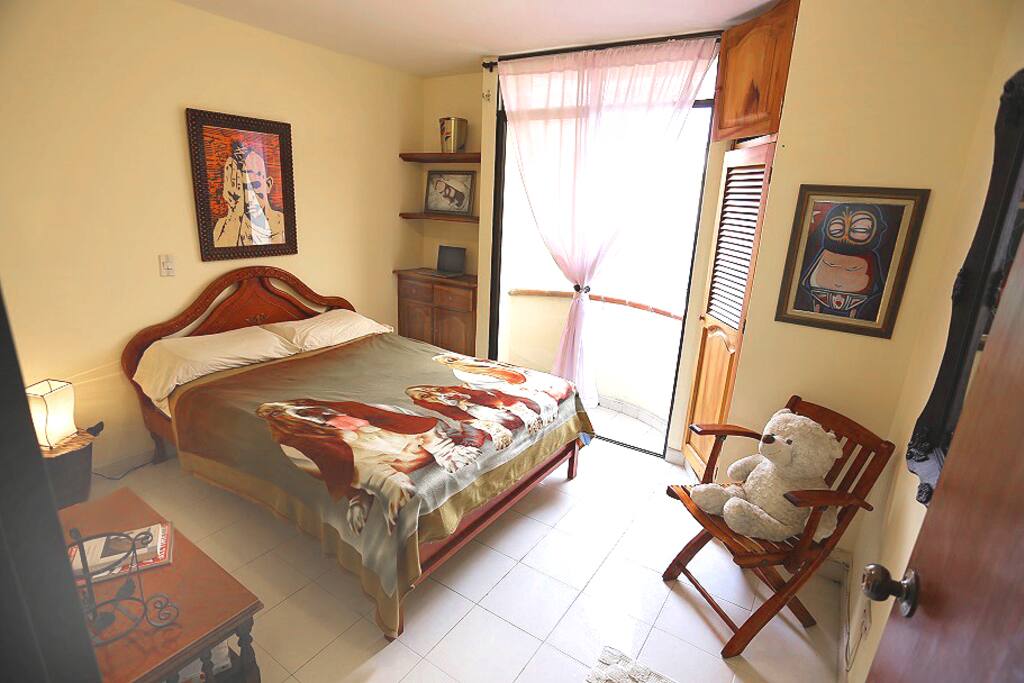 Queen-sized bedroom and balcony