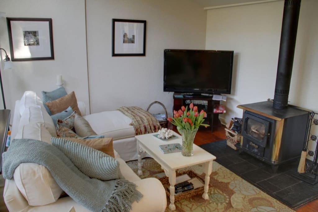 Wood buring stove and 46" flat screen HDTV are perfect for a cozy night inside.