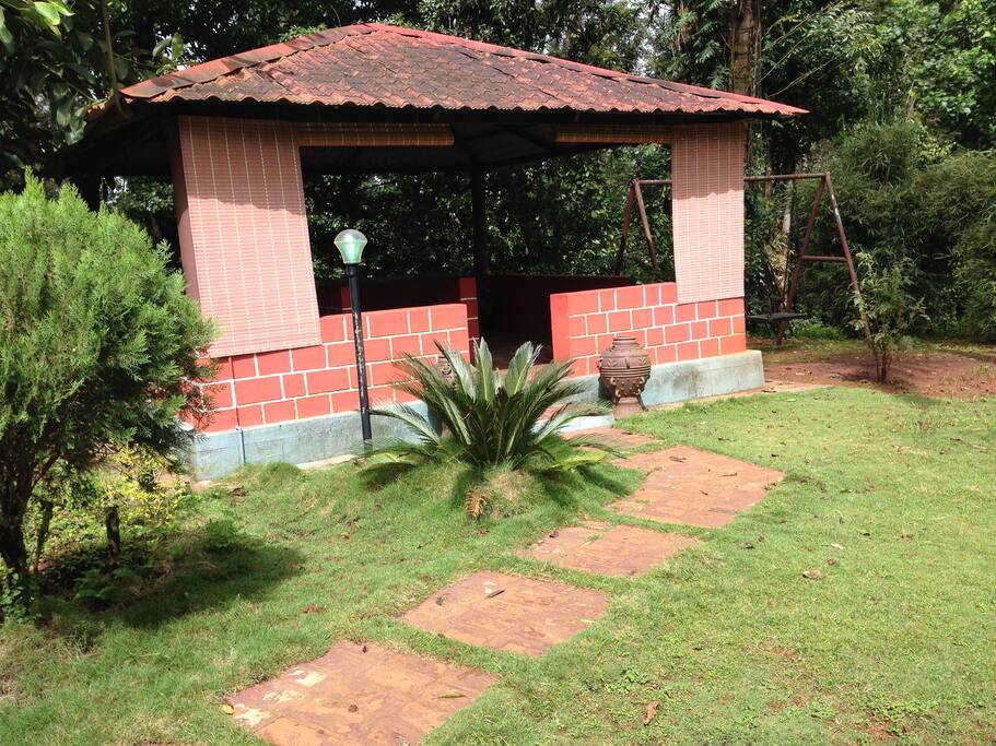 Relax in Gazebo overlooking the garden.. Ideal hangout for evening drinks and bonfire
