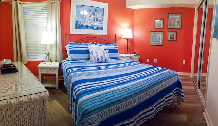 second bedroom with queen bed and access to second bathroom