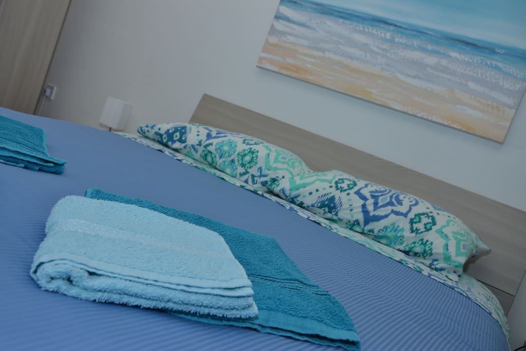 Bathroom towels and full bed linen including duvet