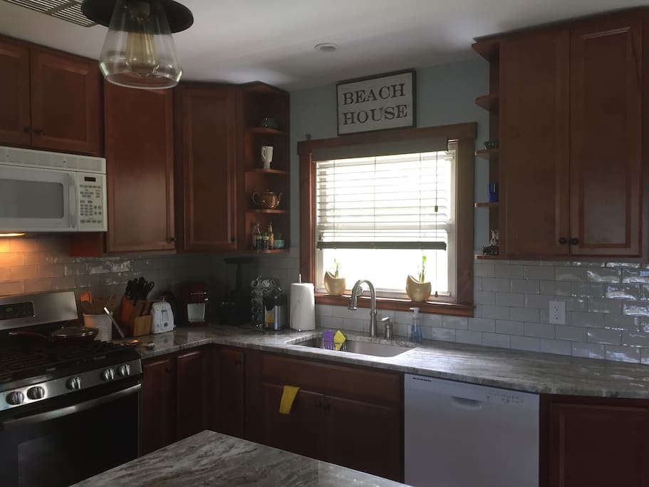 Kitchen, stone counters, tiled backsplash, countertop appliances