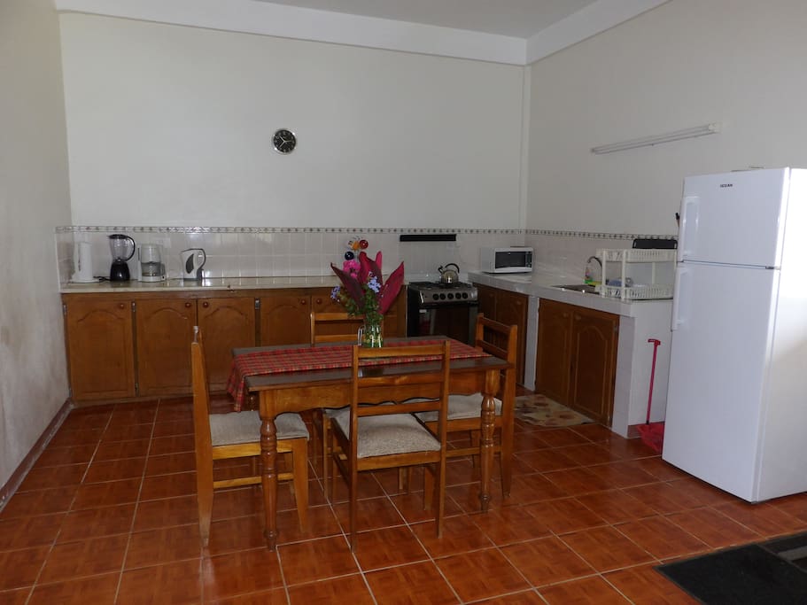 Spacious kitchen and indoor dining